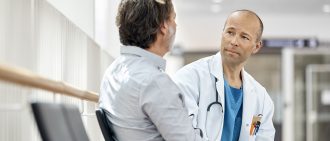 Doctor Counseling Male Patient